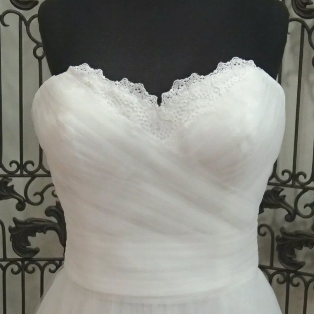Lillian West wedding dress. New with tags.